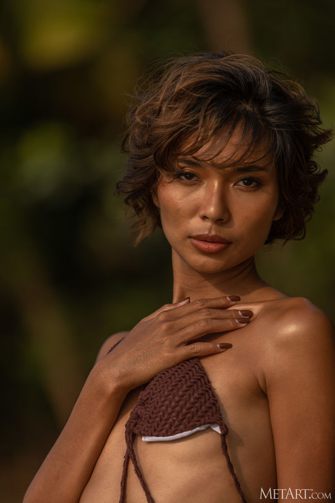 Rosah Celebrating The Tropical Heat By Tugging At The Strings That Hold Her Skimpy Bikini