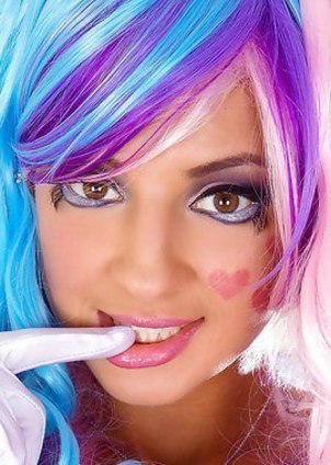 Melena Maria in sexy colorful costume