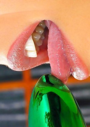 Sweet Liz Honey trys her new green dildo