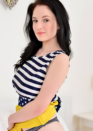 Busty teen strokes cunt with vibrator