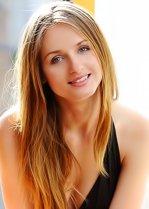 Hot blonde in black is enjoying great solo on the sofa