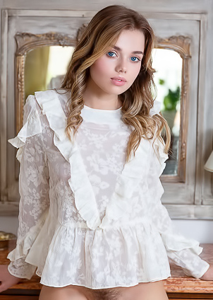 Keira Blue Getting Naked And Sitting With Thighs Parted