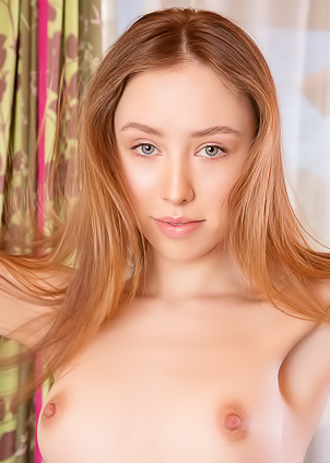 Rosalind Bends Over For A Sneak Peek At Her Shaved Pussy