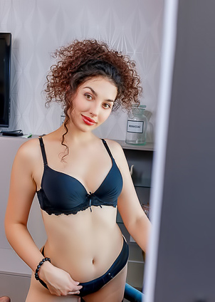 Electra Noir Revealing Her Lovely Breasts And Stroking Her Stiff Nipples