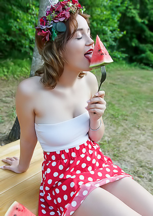 Rokki Parts Her Thighs So Her Scarlet Polka Dot Skirt Rides Up