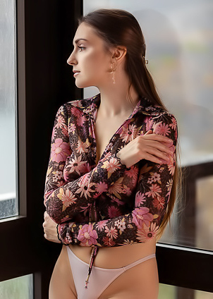 Monika May Sinking Naked Into The Plush Embrace Of An Armchair