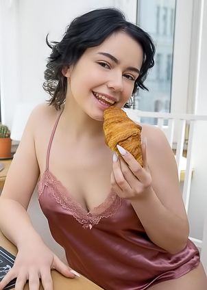 Baiba Her Curly Black Hair Framing Her Face Like Playful Ink Strokes On Porcelain