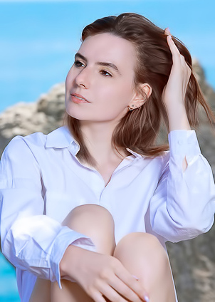 Nika Smiling With Pleasure As The Stimulating Ocean Breeze Caresses Her Sexy Body