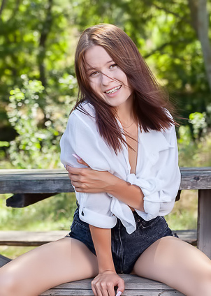 Skye Bloom Perching On A Picnic Table In The Park