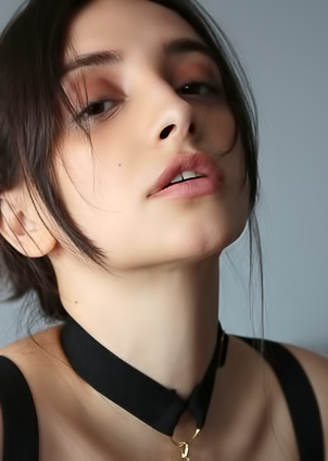 Olivia Linz Her Passionate Gaze Conveying Her Erotic Thoughts