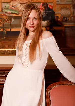 Kennedy Gracefully Perches On Antique Chair Spread Legs Teasing With Naughty Grin