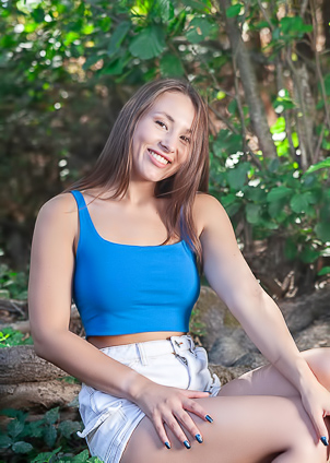 Sumiko teasing outdoors in wet crop top showing off her shaved pussy and perky nipples